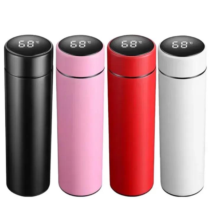 Smart insulated bottle with LED display, keeps drinks hot or cold for 24 hours, ideal for travel.