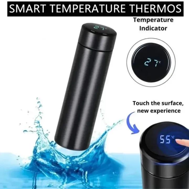 Smart insulated bottle with LED display, keeps drinks hot or cold for 24 hours, ideal for travel.